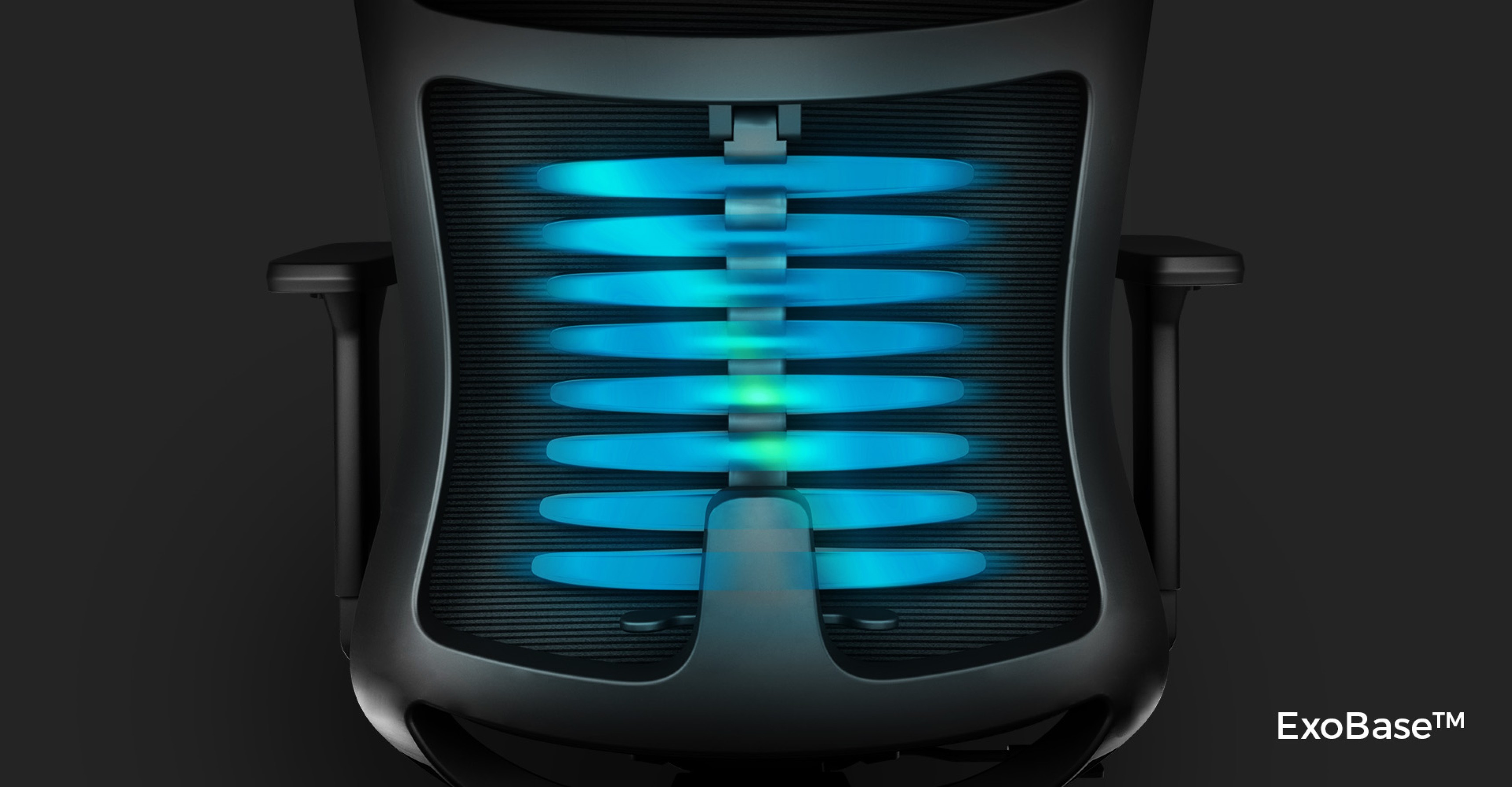 Draufsicht auf den ergonomischen Stuhl Genesis Astat 700 G2 schwarz mit dem blauen ExoBase™ Wirbelsäulenstützsystem