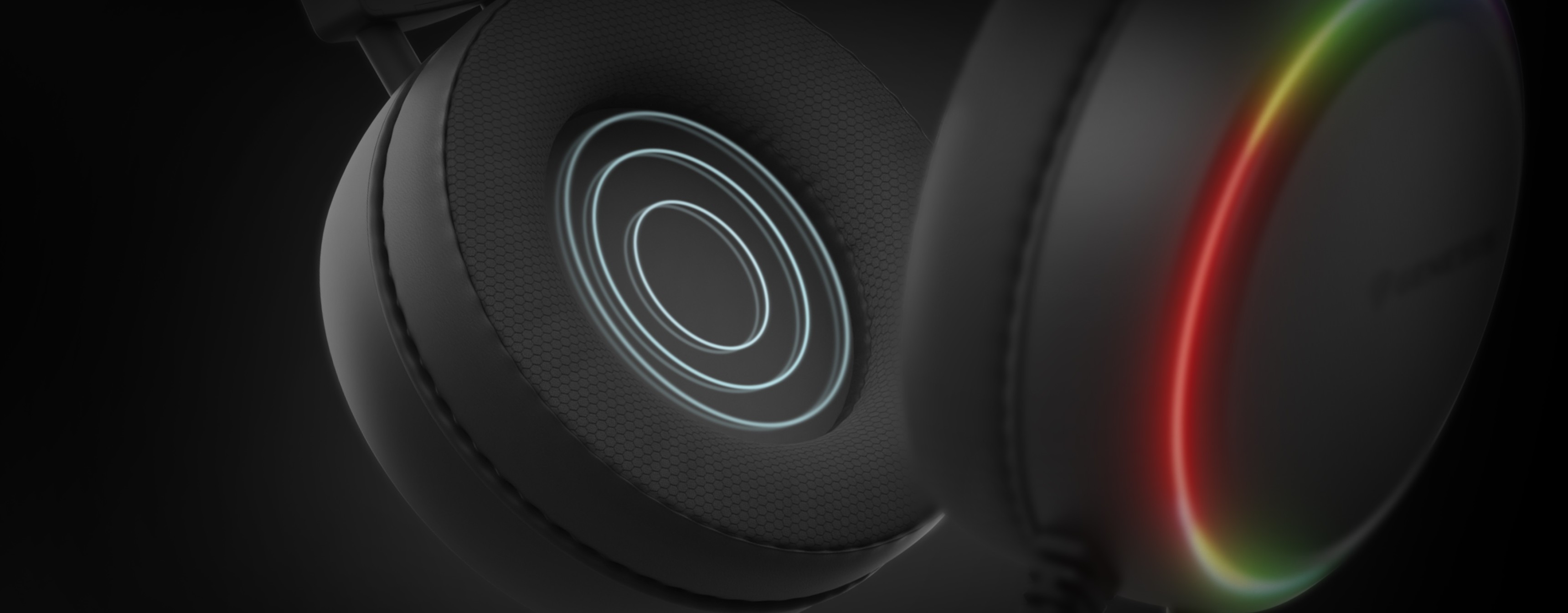 Nahaufnahme des schwarzen Genesis Neon 613 G2 RGB Over-Ear-Kopfhörers mit leuchtenden Akzenten und eingebautem Mikrofon